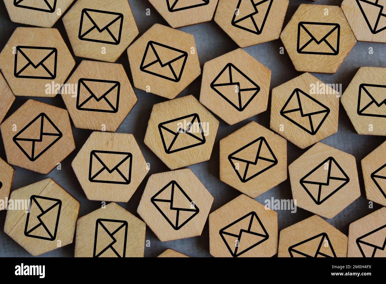 Top view image of wooden cubes with mail icon. Junk email, spam mail and email overload concept Stock Photo