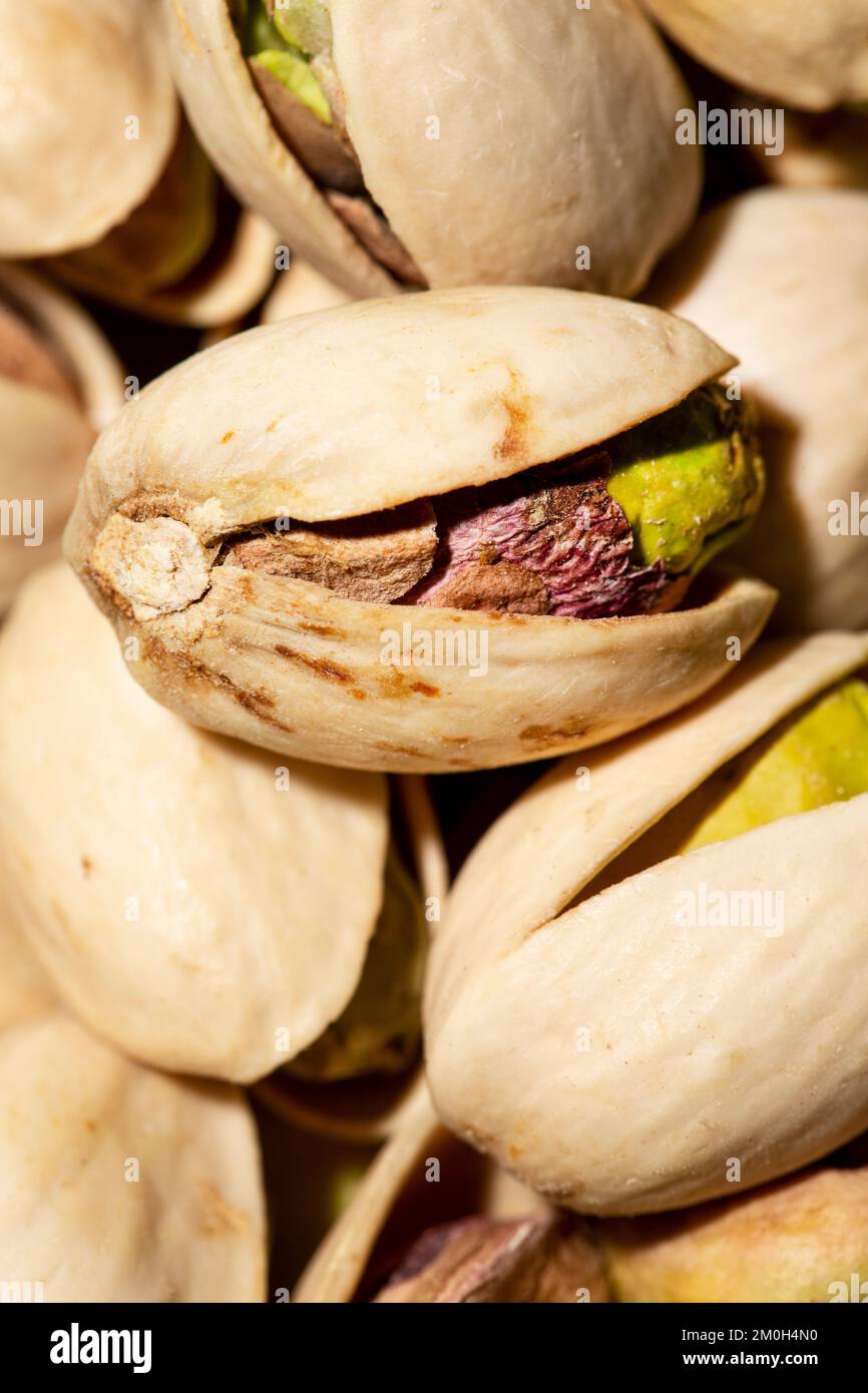 Pistachio texture as background. Close up shot of pistachios. Macro