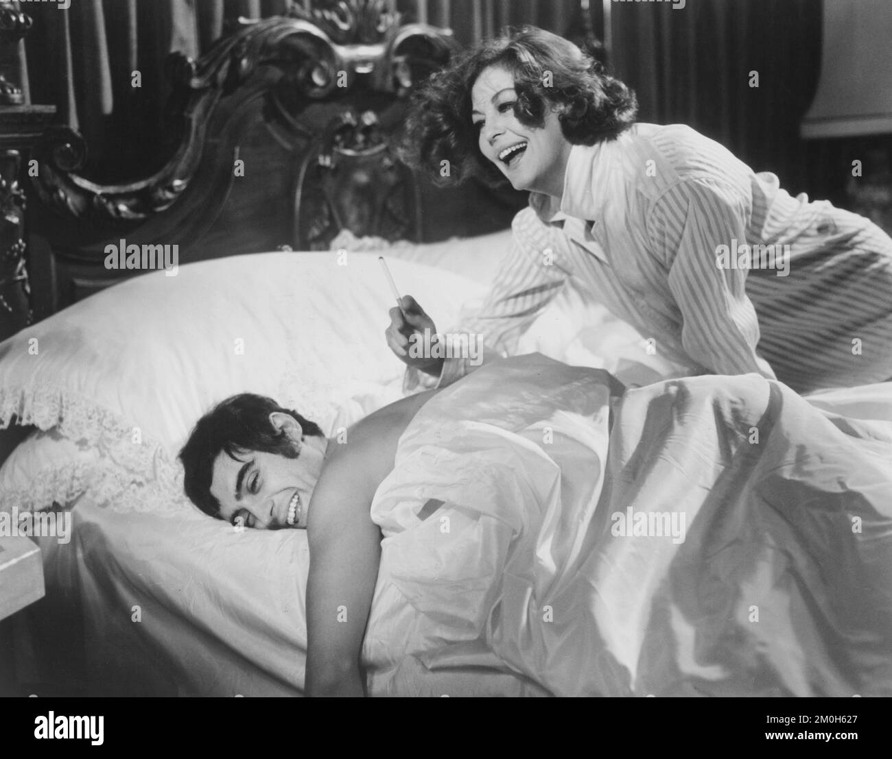 Ian McShane, Ava Gardner, on-set of the British Film, 'The Devil's Widow', aka 'Tam-Lin', American International Pictures, 1970 Stock Photo