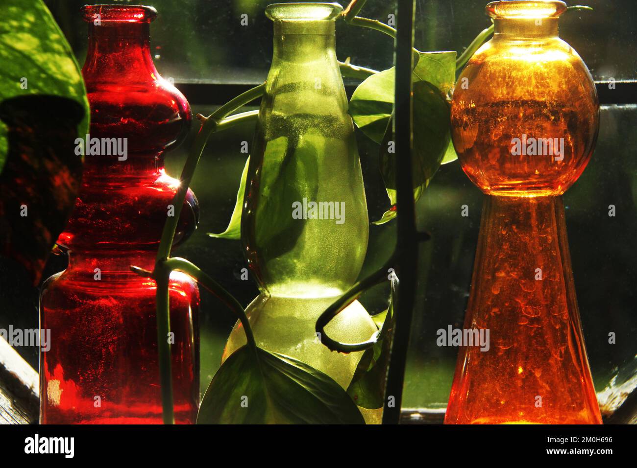 Colorful decorative glass by a window Stock Photo