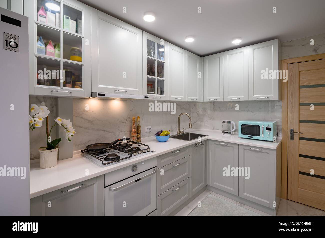 White and grey new modern well designed kitchen furniture Stock Photo ...
