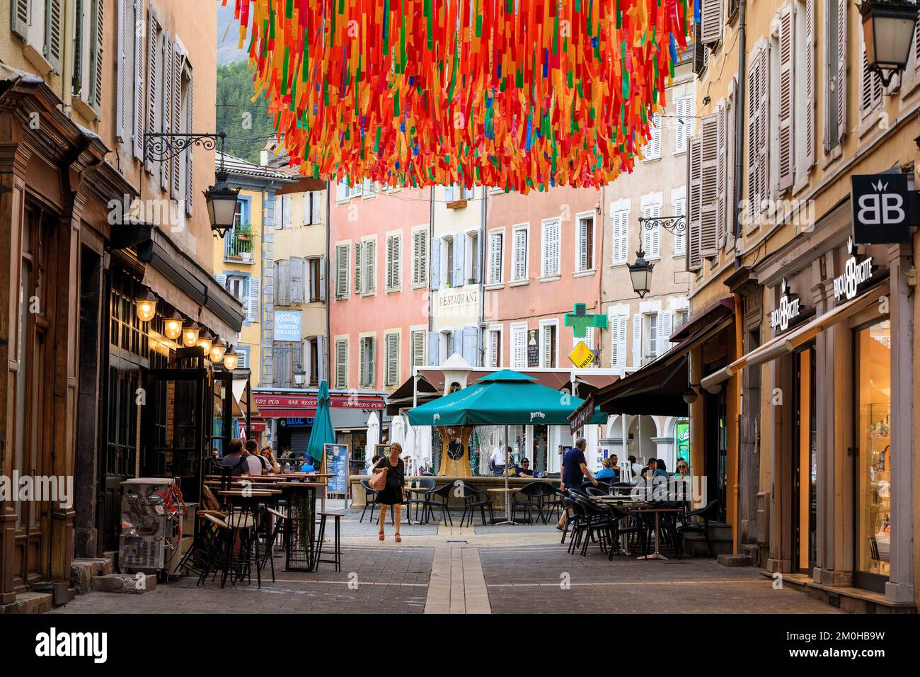 France, Hautes Alpes, Gap, rue Elisee, place Jean Marcellin and fountain in the background Stock Photo