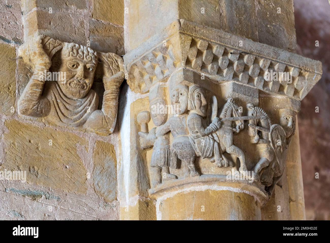 France, Aveyron, Conques, labeled One of the Most Beautiful Villages of France, stage on the way to Compostela, Sainte Foy Romanesque abbey church, listed as World Heritage by UNESCO, capital of the upper floor, the fight of the knights Stock Photo