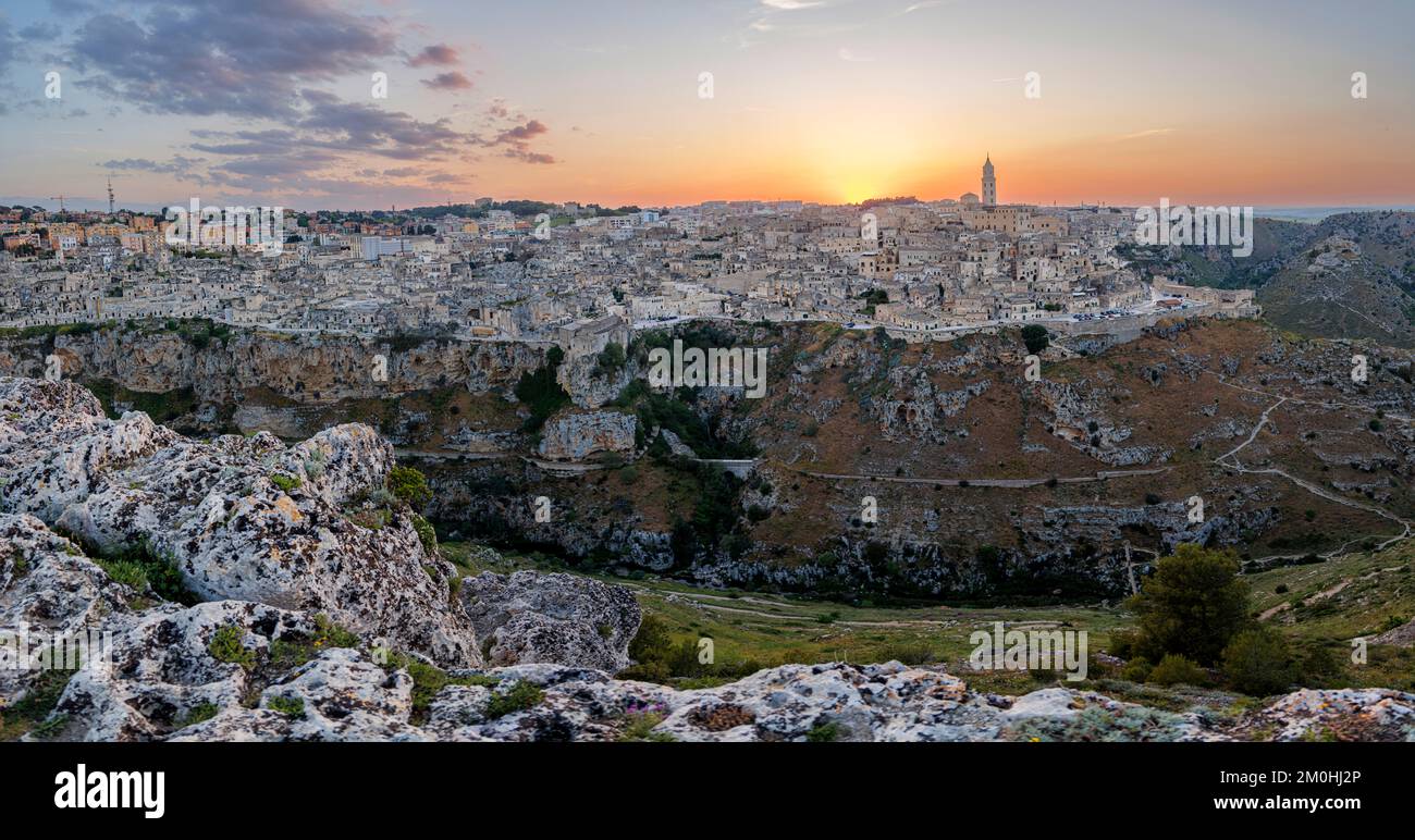 Italy, Basilicata, Matera, The Sassi and the park of the rupestrian churches listed as World Heritage by UNESCO, sunset from Murgia Timone belvedere Stock Photo