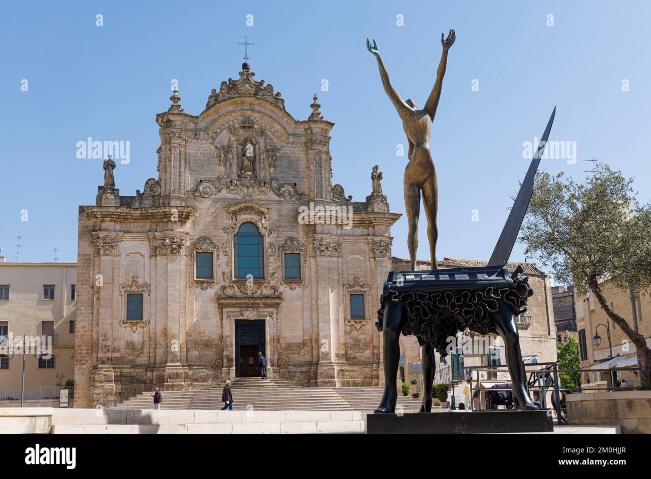 Italy, Basilicata, Matera, The Sassi and the park of the rupestrian churches listed as World Heritage by UNESCO, Piazza San Francesco d'Assisi, Surrealist Piano Salvador Dali sculpture Stock Photo