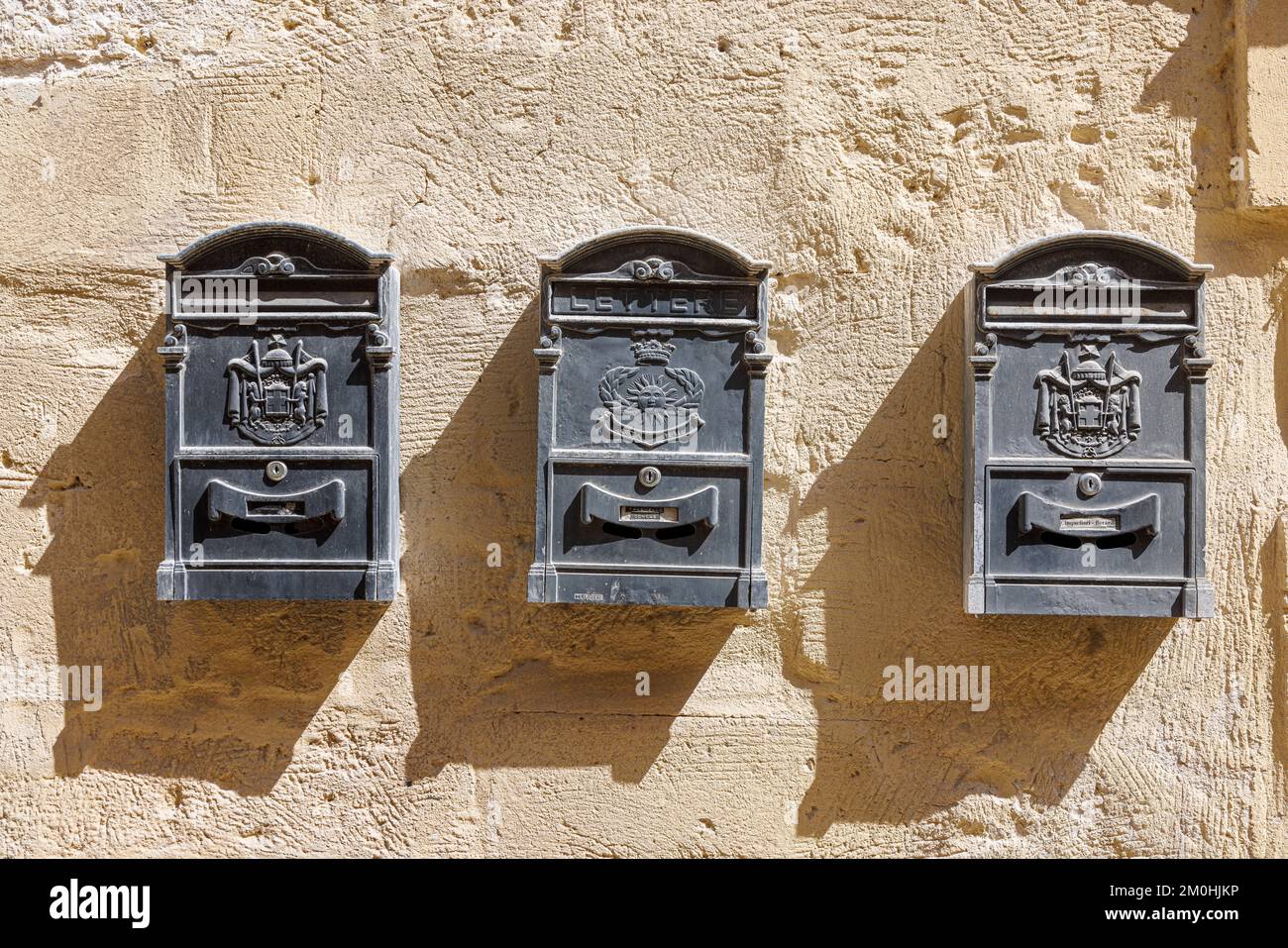 Italy, Basilicata, Matera, The Sassi and the park of the rupestrian churches listed as World Heritage by UNESCO, Sasso Barisano, mailboxes Stock Photo