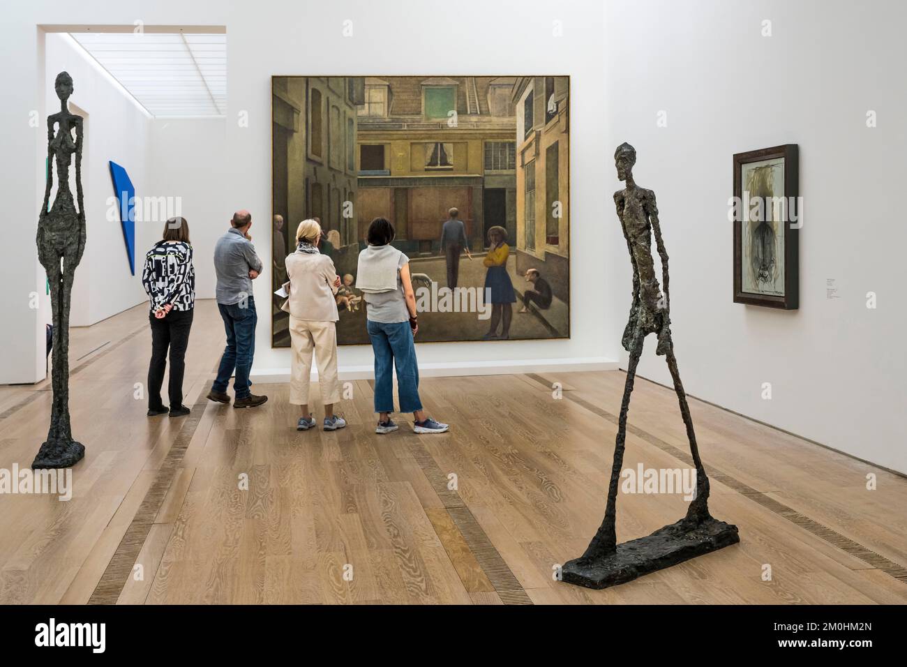 Switzerland, Basel, Riehen, Beyeler Foundation, Large Woman IV (1960) and The Walking Man (1960) by Alberto Giacometti, Passage du Commerce-Saint-Andr? (1952-1954) by Balthus in the background Stock Photo