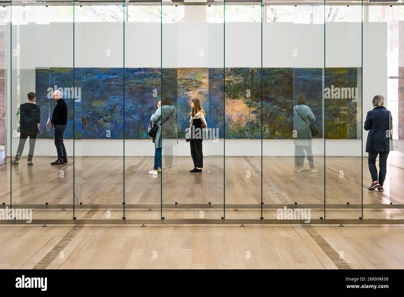Switzerland, Basel, Riehen, Beyeler Foundation, 12 Scheiben (Reihe) (2013) by Gerhard Richter in the foreground and the water-lily pond by the painter Claude Monnet Stock Photo