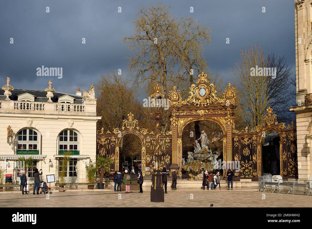 France, Meurthe-et-Moselle, Nancy, place Stanislas (former Place Royale) during the feast of Saint-Nicolas, listed as World Heritage by UNESCO, Amphitrite Fountain and golden gate by Jean Lamour Stock Photo