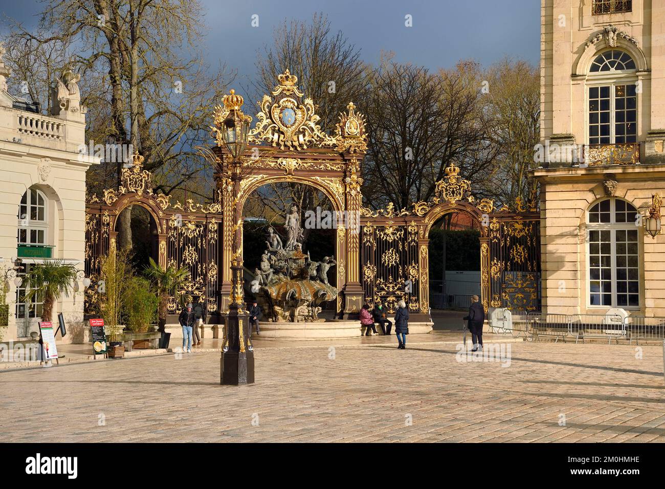 France, Meurthe-et-Moselle, Nancy, place Stanislas (former Place Royale) during the feast of Saint-Nicolas, listed as World Heritage by UNESCO, Amphitrite Fountain and golden gate by Jean Lamour Stock Photo