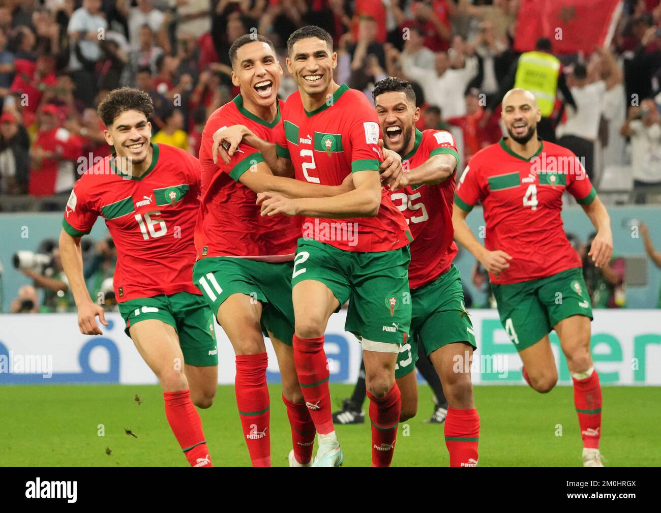 Al Rayyan, Qatar. 6th Dec, 2022. Players of Morocco celebrate victory after winning the Round of 16 match between Morocco and Spain of the 2022 FIFA World Cup at Education City Stadium in Al Rayyan, Qatar, Dec. 6, 2022. Credit: Li Gang/Xinhua/Alamy Live News Stock Photo