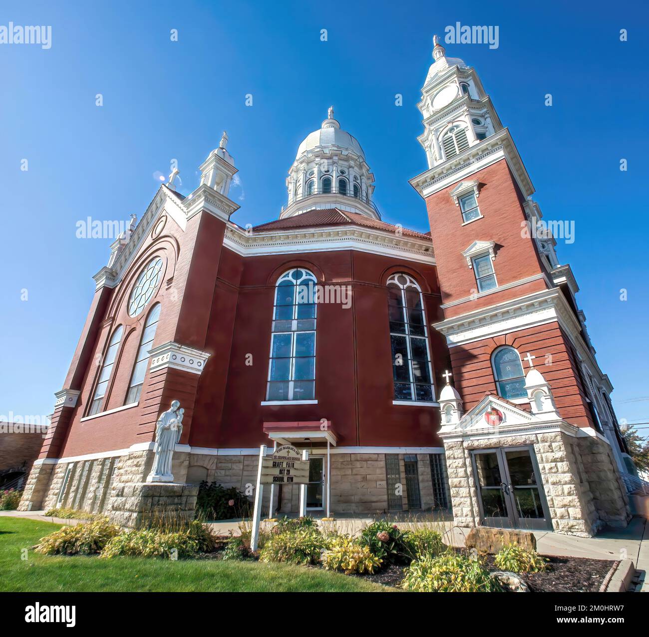 Wide angle view of the historic Basilica of St. Stanislaus Catholic Church built in 1894 in the Polish Cathedral Style in Winona, Minnesota USA. Stock Photo