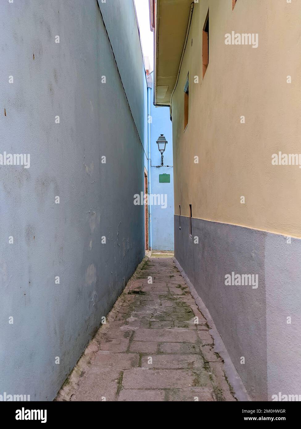 European old town narrow street with vintage lantern, Porto, Portugal Stock Photo