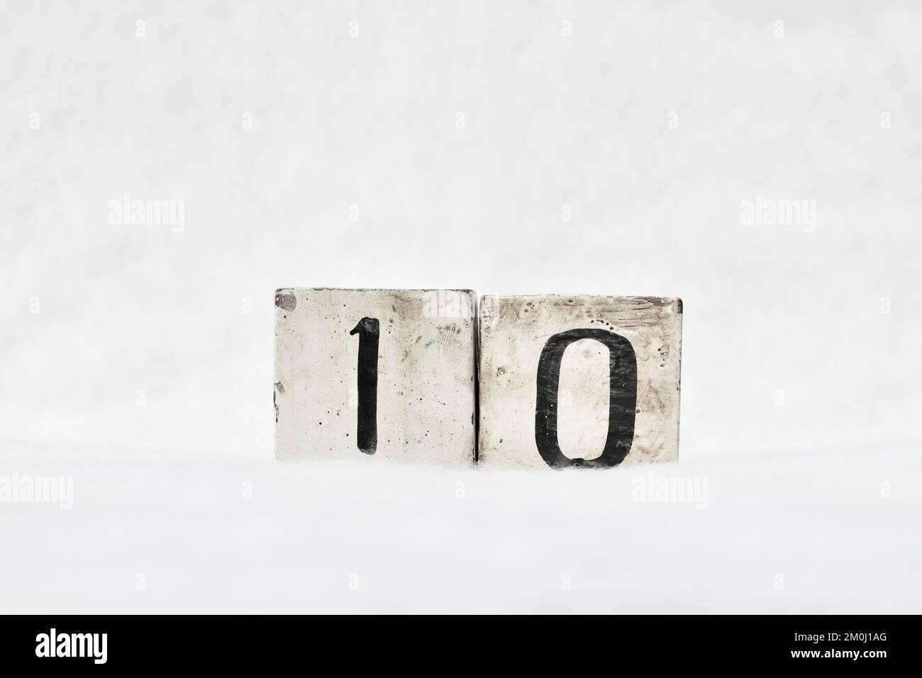 10 vintage block calendar on white mottled background, copy space for