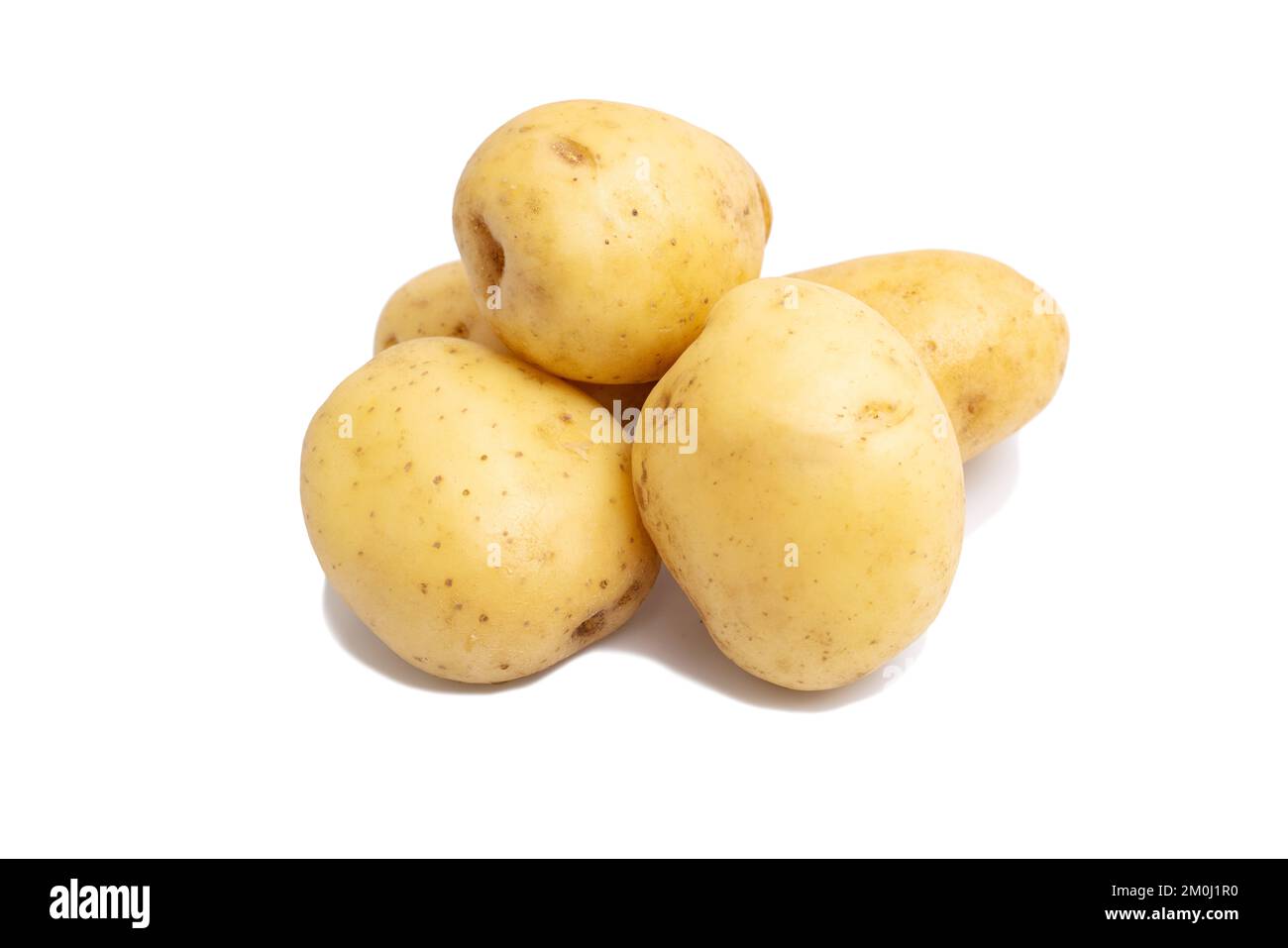 Group of potatoes isolated on white background close up. Raw potato