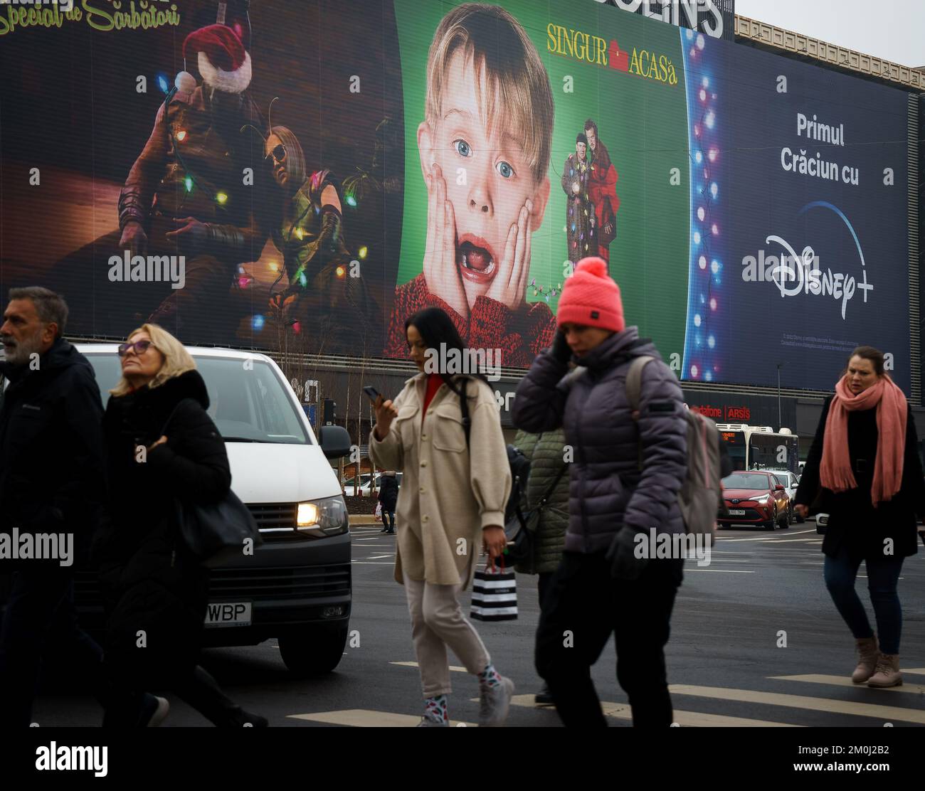 Bucharest, Romania - November 22, 2022: Extra large banner advertising Home Alone movie is displayed on the Unirea Shopping Center, in downtown Buchar Stock Photo