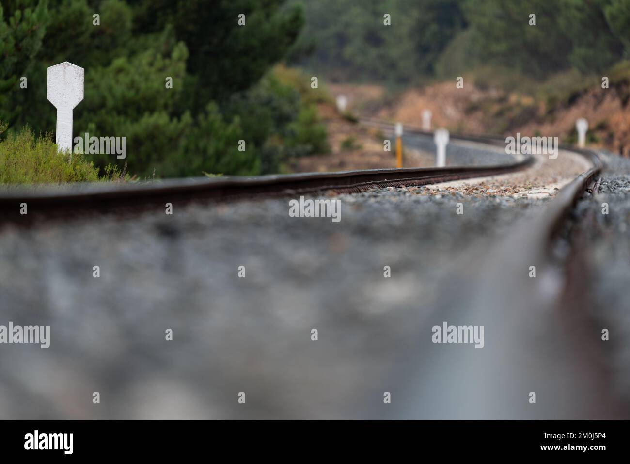 Railroad track perspective view with blurred space for text Stock Photo