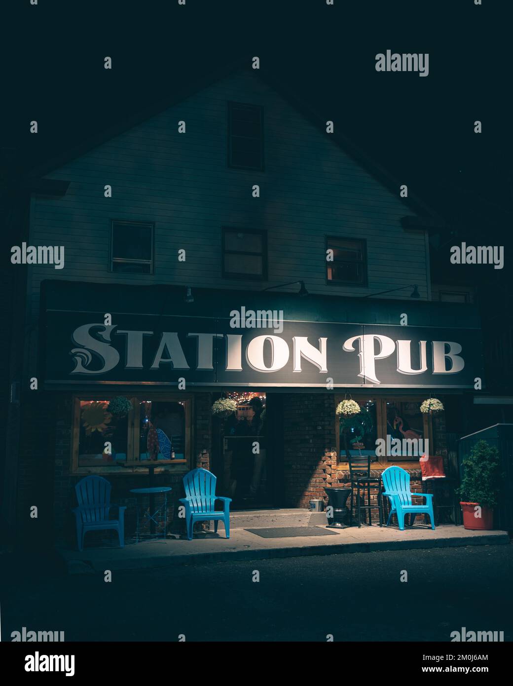 Station Pub sign at night, Sayville, New York Stock Photo Alamy