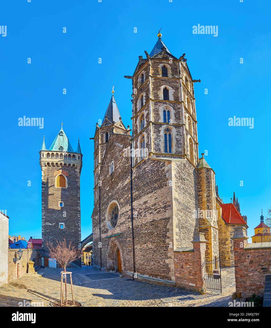 The court in front of the Gothic St Bartholomew Parish Church, located atop Bartholomew Hill, Kolin, Czech Republic Stock Photo