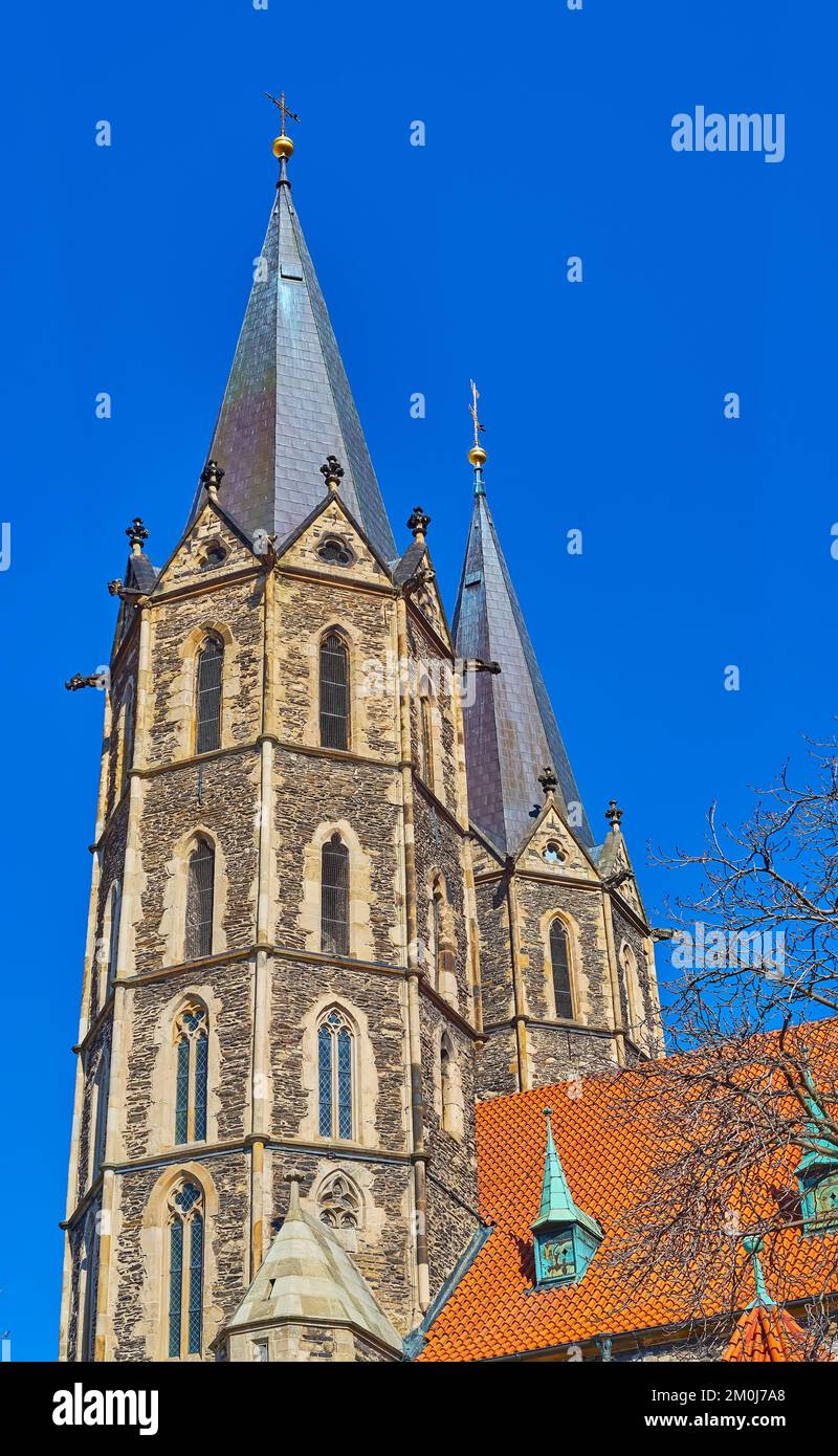 Tall stone bell towers of medieval St Bartholomew Parish Church, Kolin