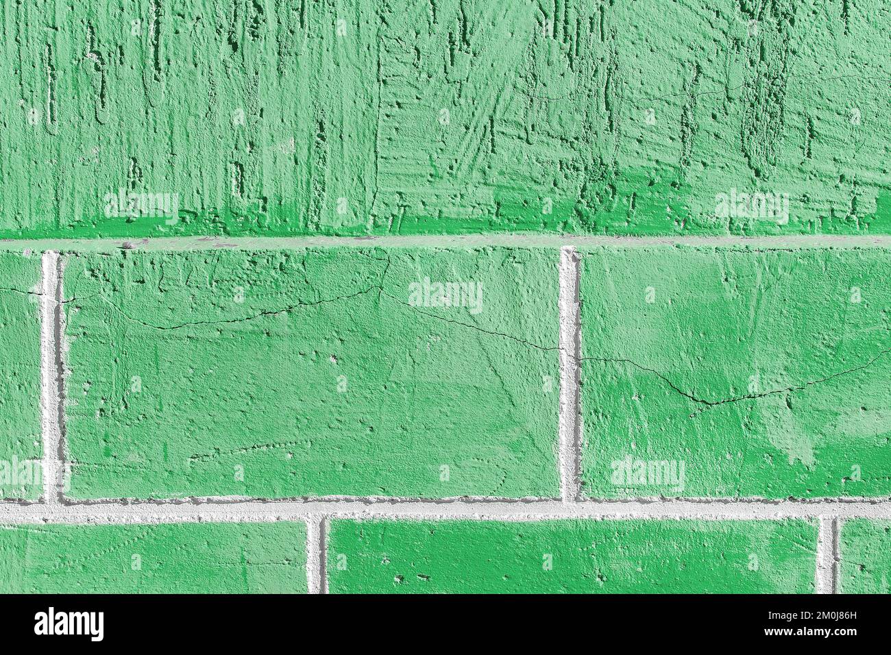 Green verdant paint wall brick blocks texture background facade