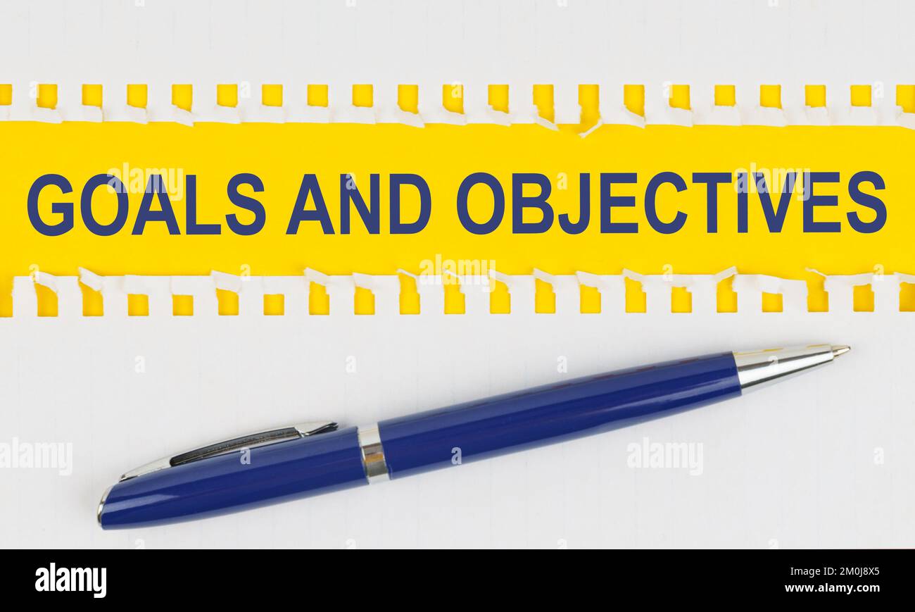 Business and finance. On the table are two sheets from a notebook and a ...