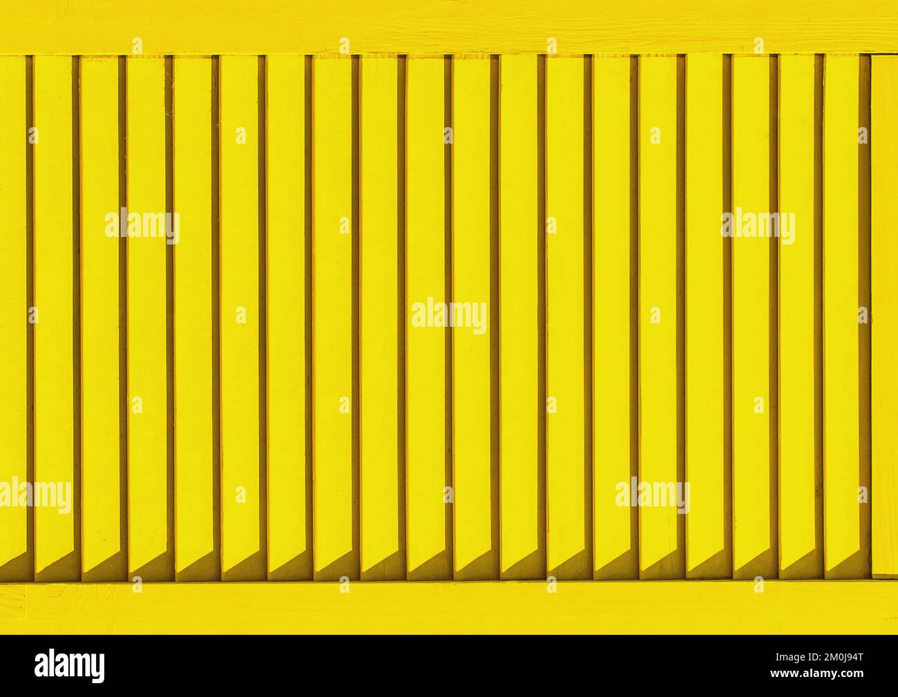 Part of modern interior with yellow horizontal patterned texture of