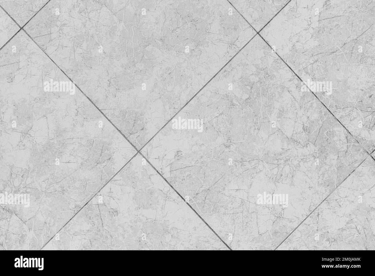 Light gray white ceramic floor tiles with abstract texture background