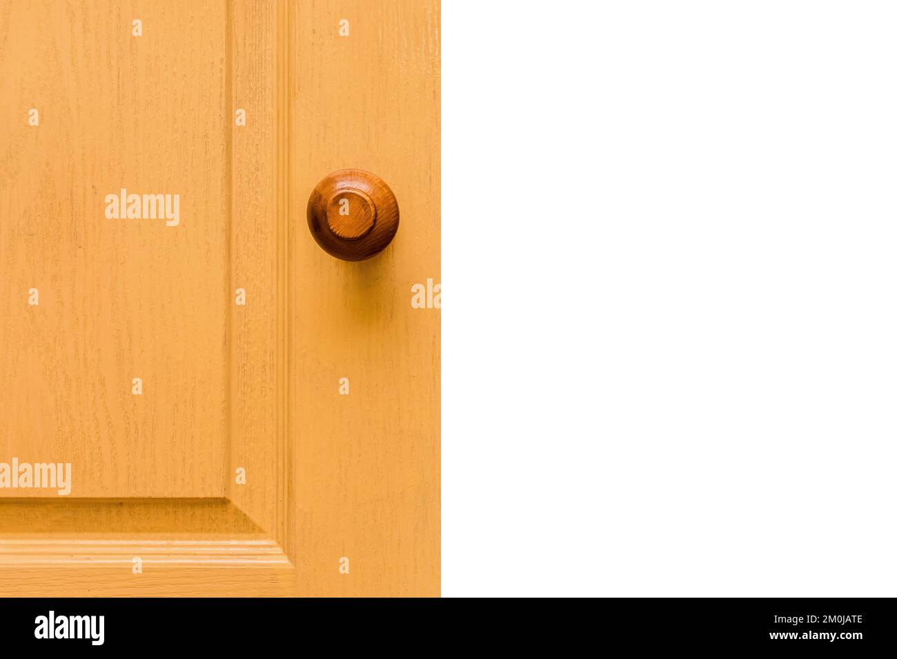 Yellow wooden door, element of interior room exit open home doorway white isolated background. Stock Photo