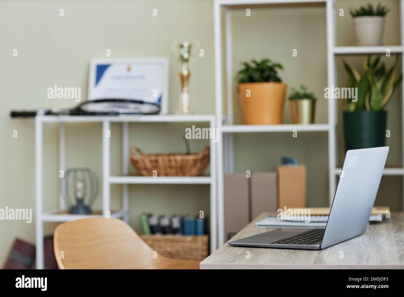 Background image of open laptop at home office workplace, side view Stock Photo