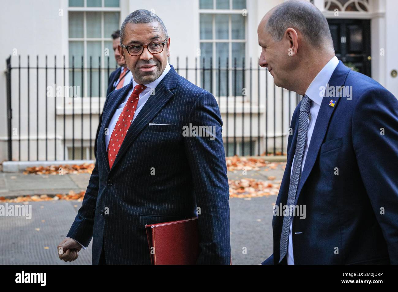 London, UK. 06th Dec, 2022. James Cleverly, MP, Secretary of State for Foreign, Commonwealth and Development Affairs (Foreign Secretary) walks with a colleague. Ministers in the Sunak government attend the weekly cabinet meeting at 10 Downing Street in Westminster today. Credit: Imageplotter/Alamy Live News Stock Photo