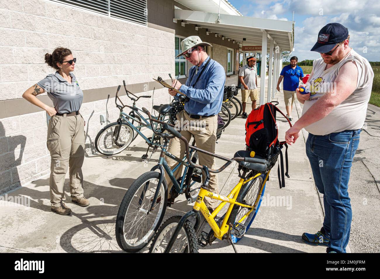 Everglades National Park Miami Florida,Tamiami Trail US Route 41 Shark Valley Visitors Center centre bicycle rental window service business line queue Stock Photo