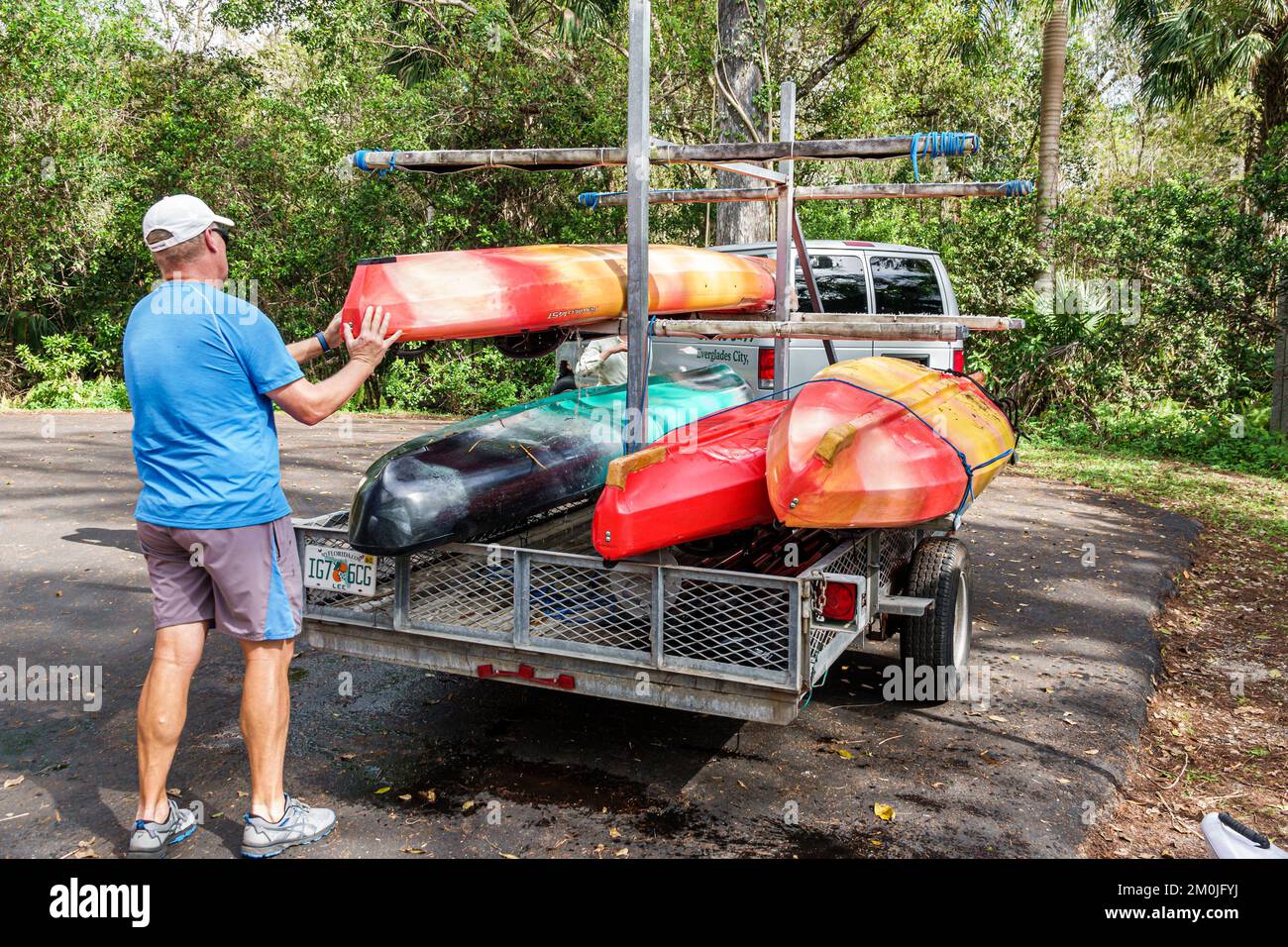 Everglades Miami Florida,Tamiami Trail US Route 41 roadside park kayak kayaks loading,man men male adult adults Stock Photo