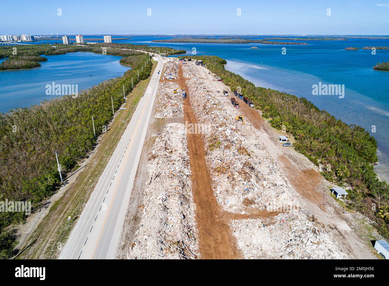 Fort Ft. Myers Beach Florida,Long Key,Lovers Key State Park,Estero Boulevard,collected piles piled mound mounds debris trash Hurricane Ian damage dest Stock Photo