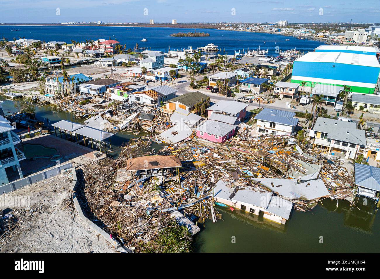 Fort Ft. Myers Beach Florida,Estero Island aerial overhead view from above,houses homes cottages property Hurricane Ian damage damaged destruction des Stock Photo