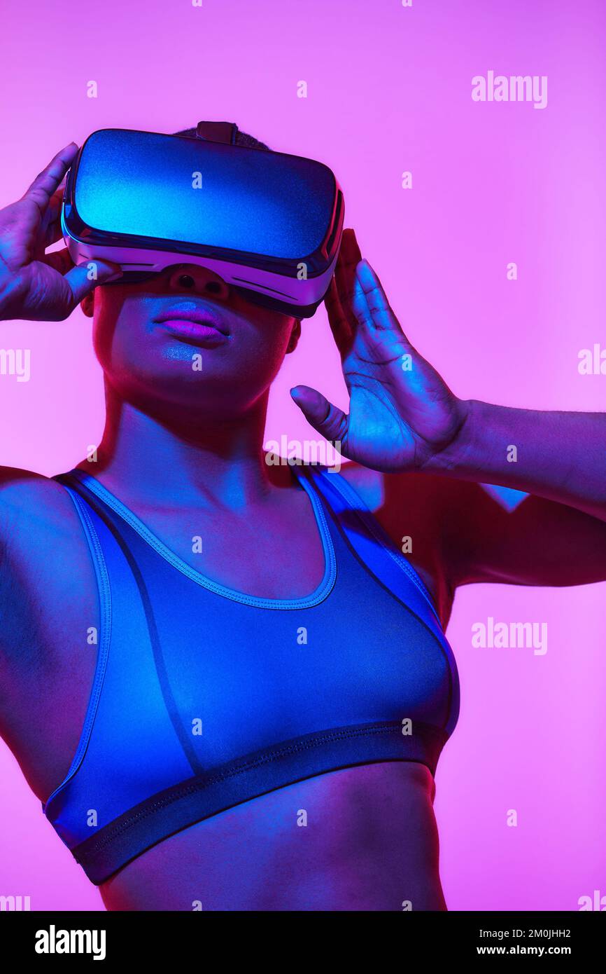 African american woman streamer playing video game using virtual ...