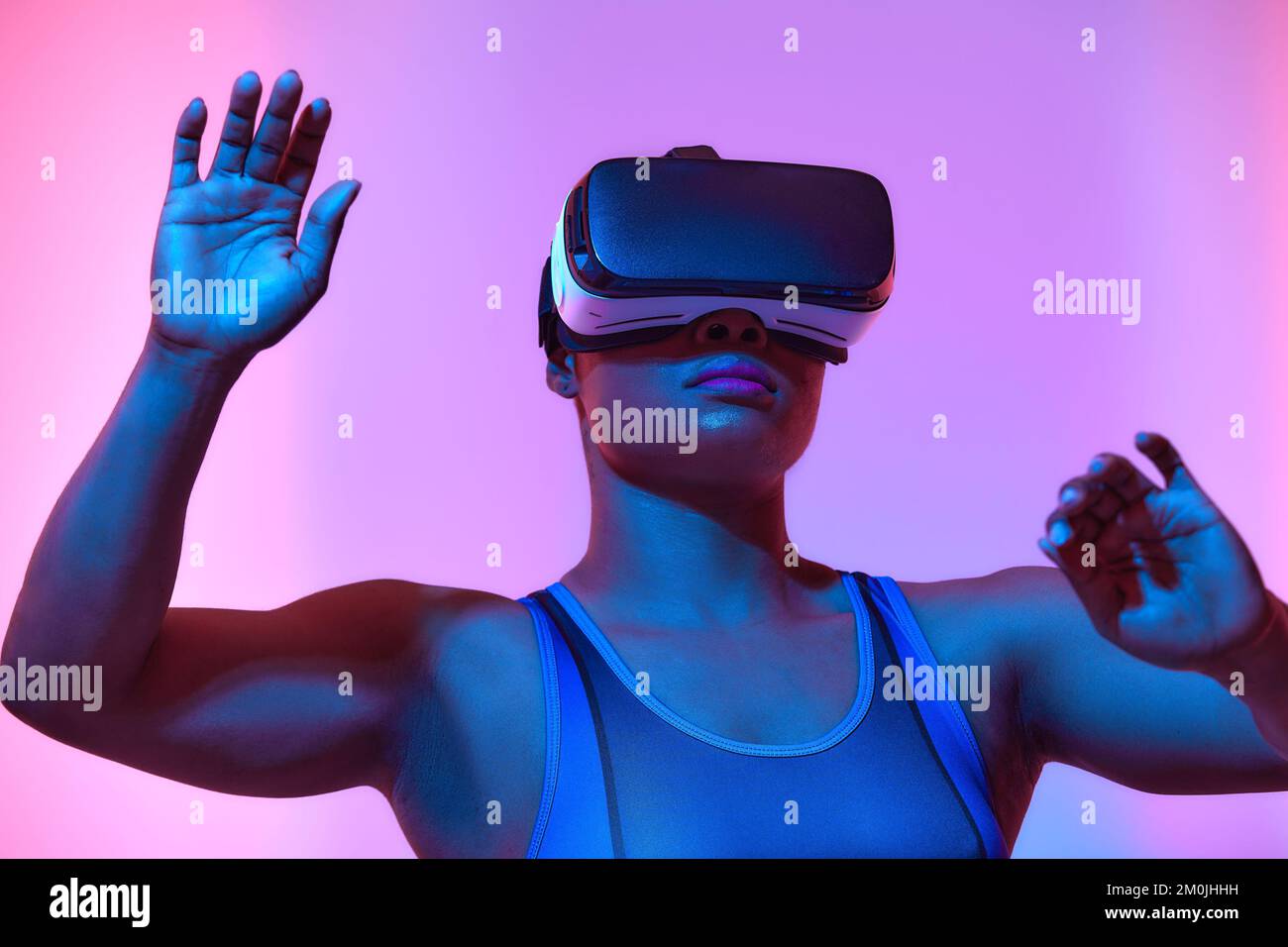 African american woman streamer playing video game using virtual ...