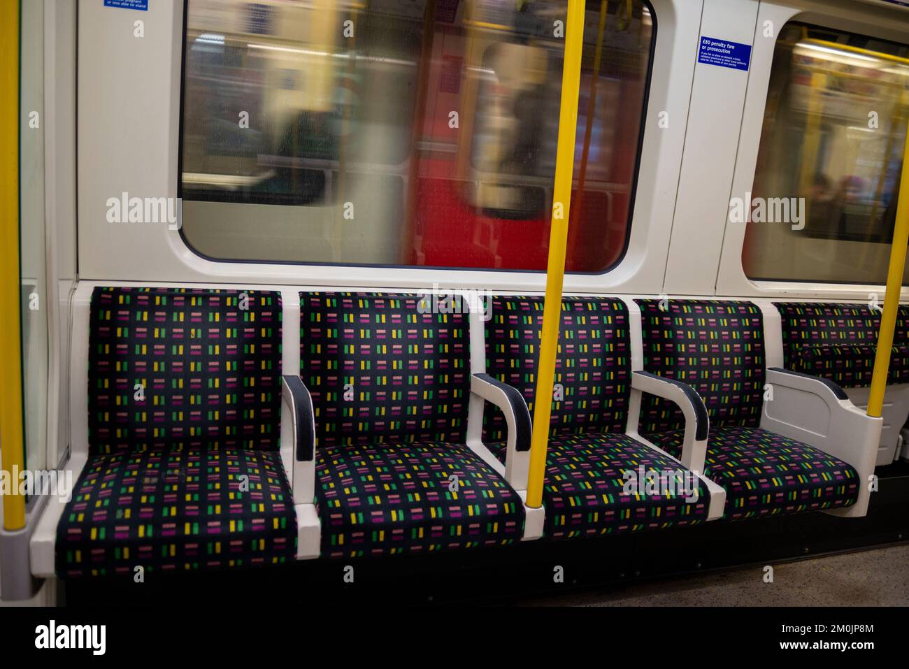 Seats on a London Underground train carriage. Tube train seats. Empty