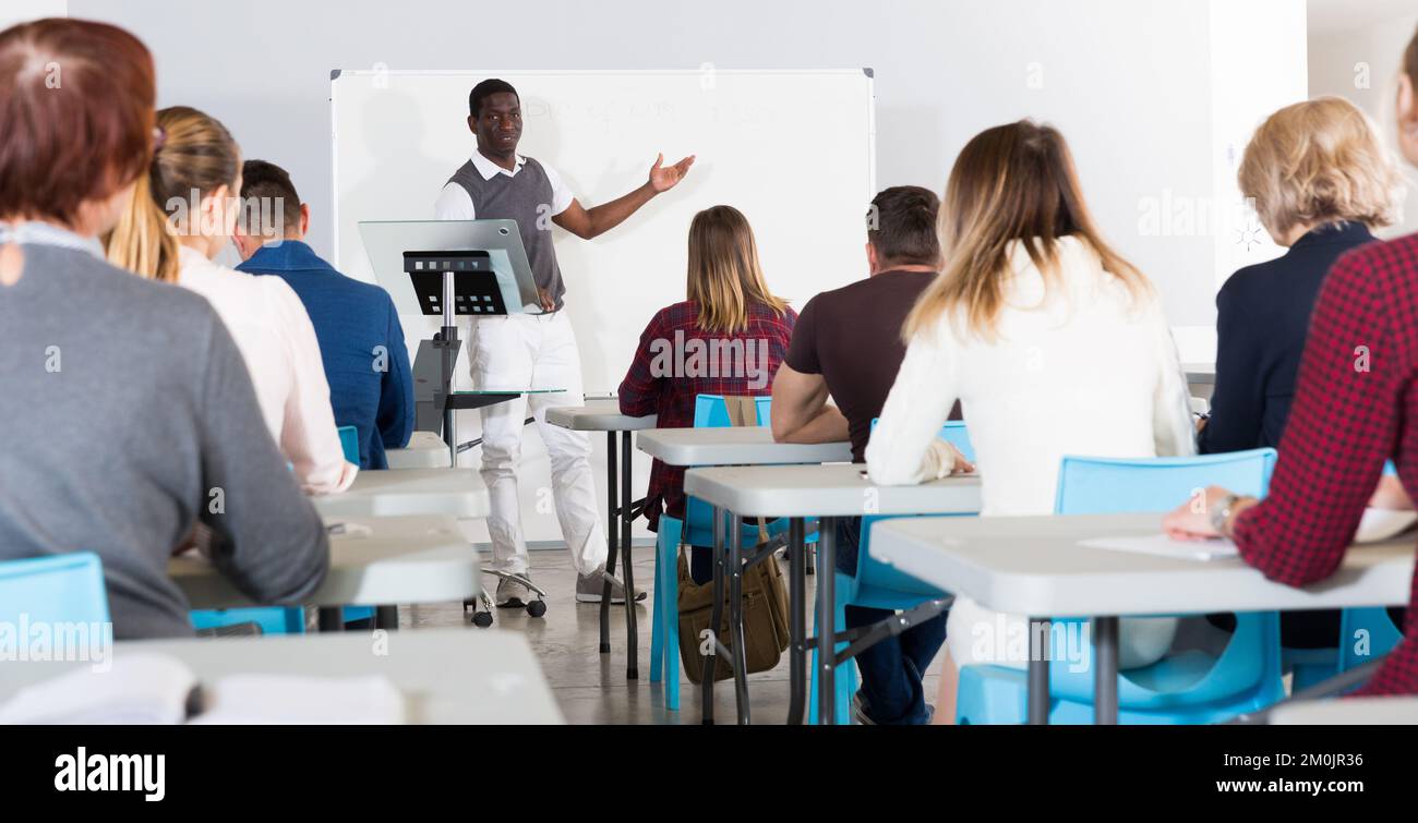 African American student answering at whiteboard Stock Photo - Alamy