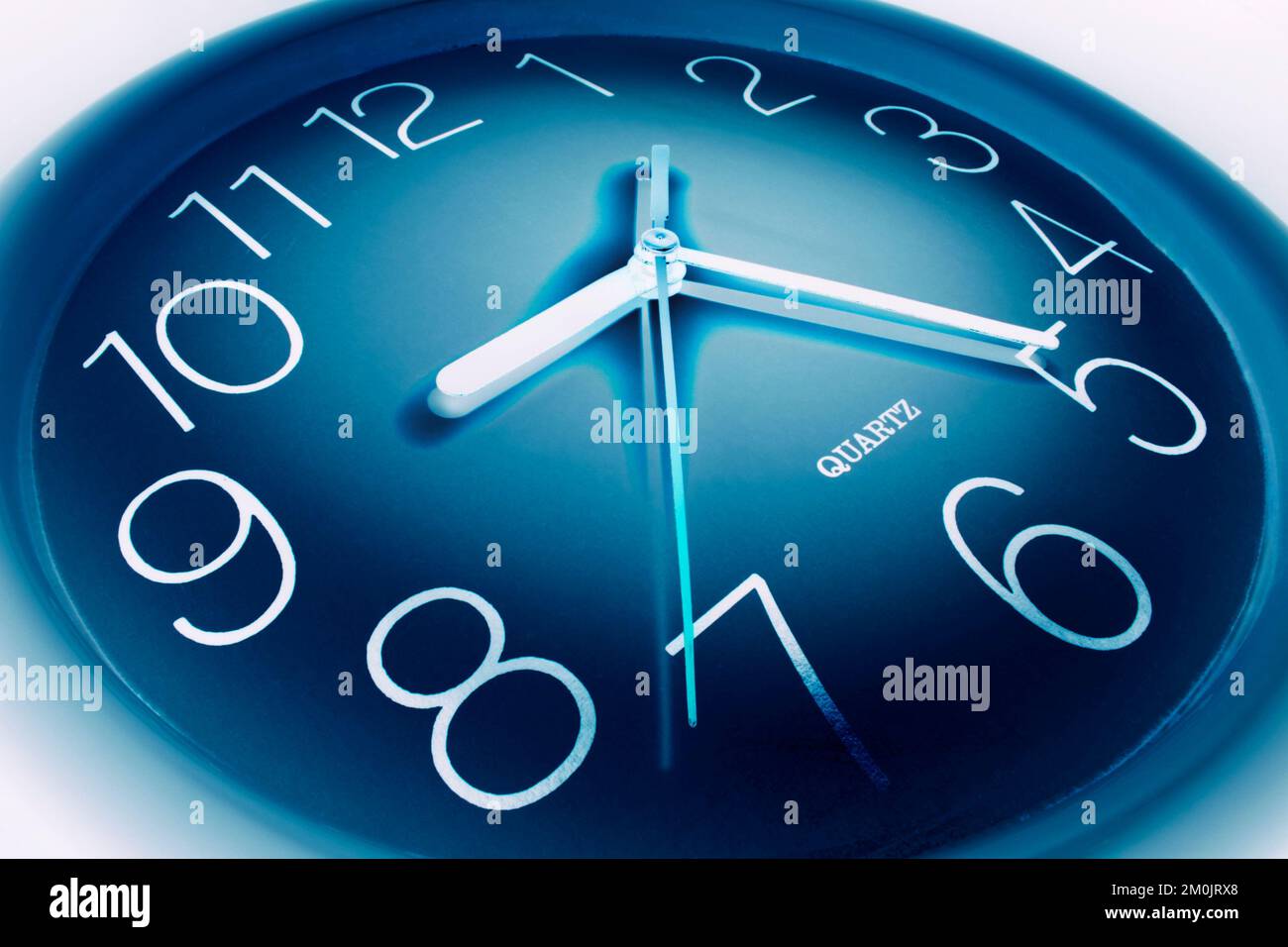 Blue numbers on clock hi-res stock photography and images - Alamy