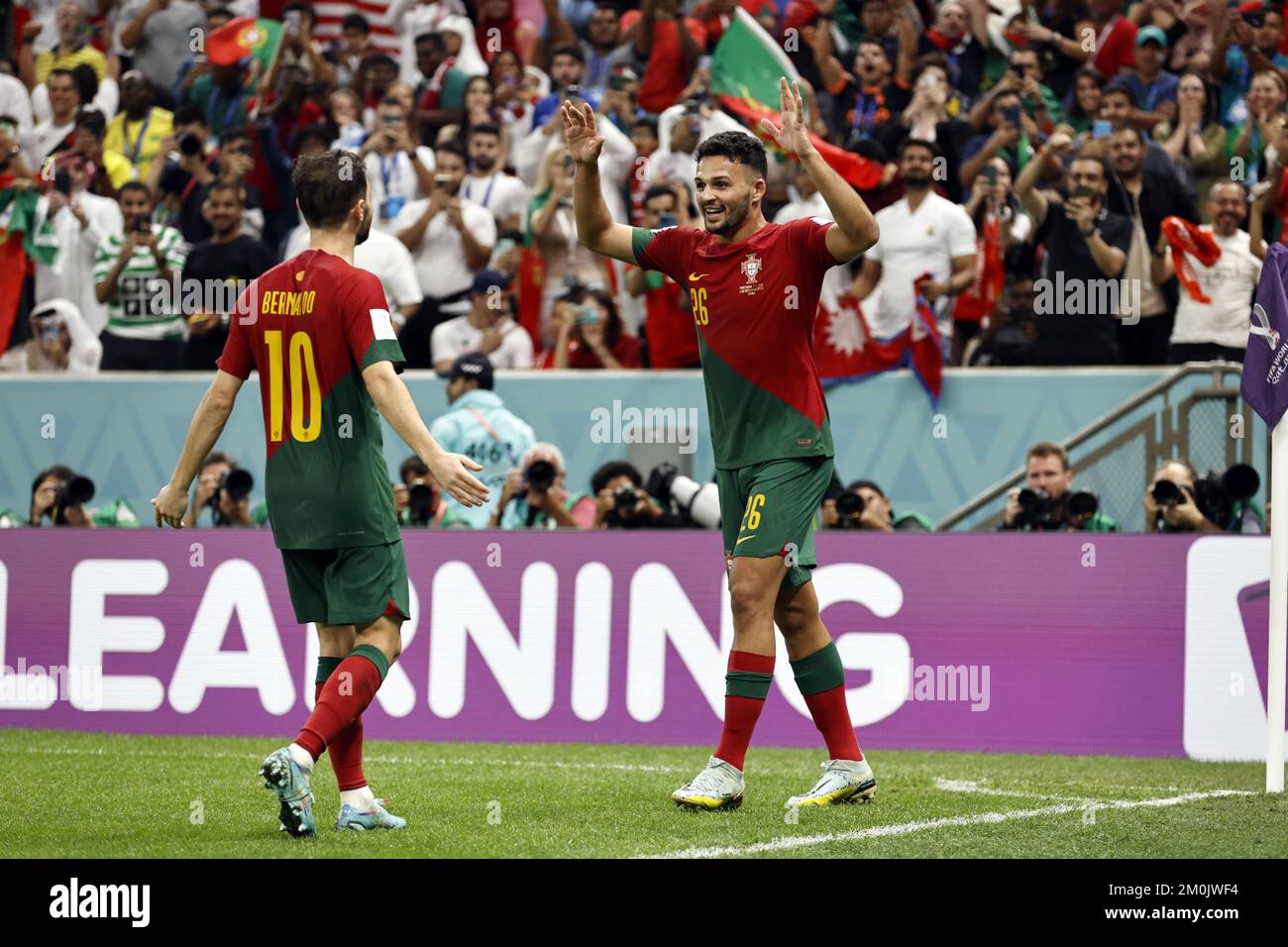 AL DAAYEN - Bernardo Silva of Portugal and Goncalo Ramos of Portugal celebrate the 5-1 during the FIFA World Cup Qatar 2022 round of 16 match between Portugal and Switzerland at Lusail Stadium on December 6, 2022 in Al Daayen, Qatar. AP | Dutch Height | MAURICE OF STONE Stock Photo