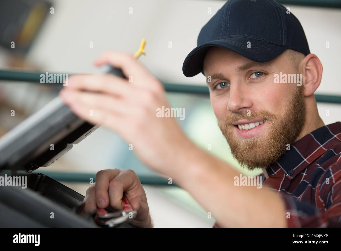 trying to repair the office printer Stock Photo