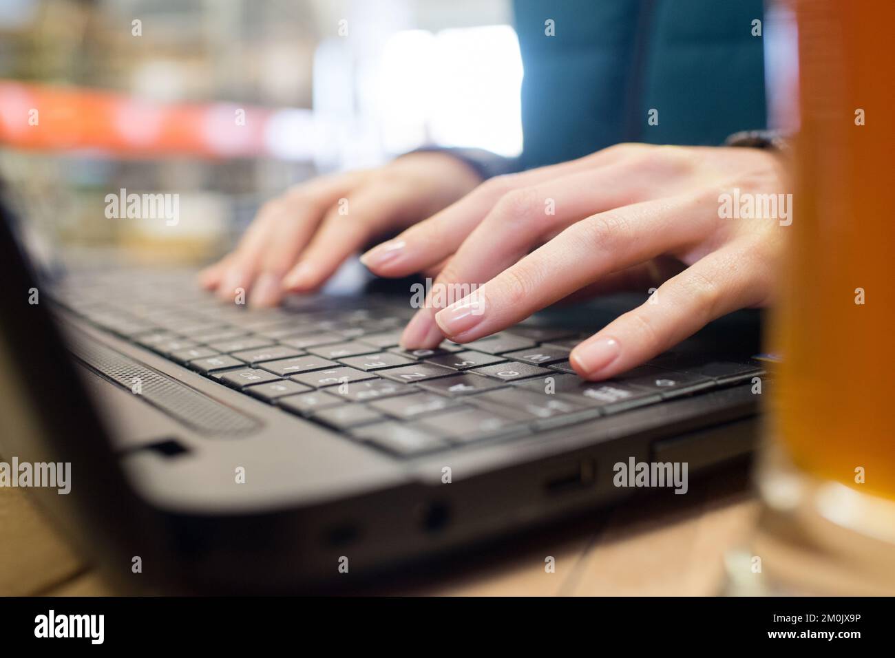 using the laptop keyboards Stock Photo Alamy