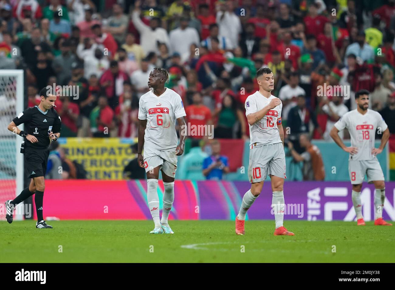 Lusail, Lusail, Qatar, Qatar. 6th Dec, 2022. LUSAIL, QATAR - DECEMBER 6: Player of Switzerland Denis Zakaria and Granit Xhaka looks dejected after Portugal's fifth goal during the FIFA World Cup Qatar 2022 Round of 16 match between Portugal and Switzerland at Lusail Stadium on December 6, 2022 in Lusail, Qatar. (Credit Image: © Florencia Tan Jun/PX Imagens via ZUMA Press Wire) Stock Photo