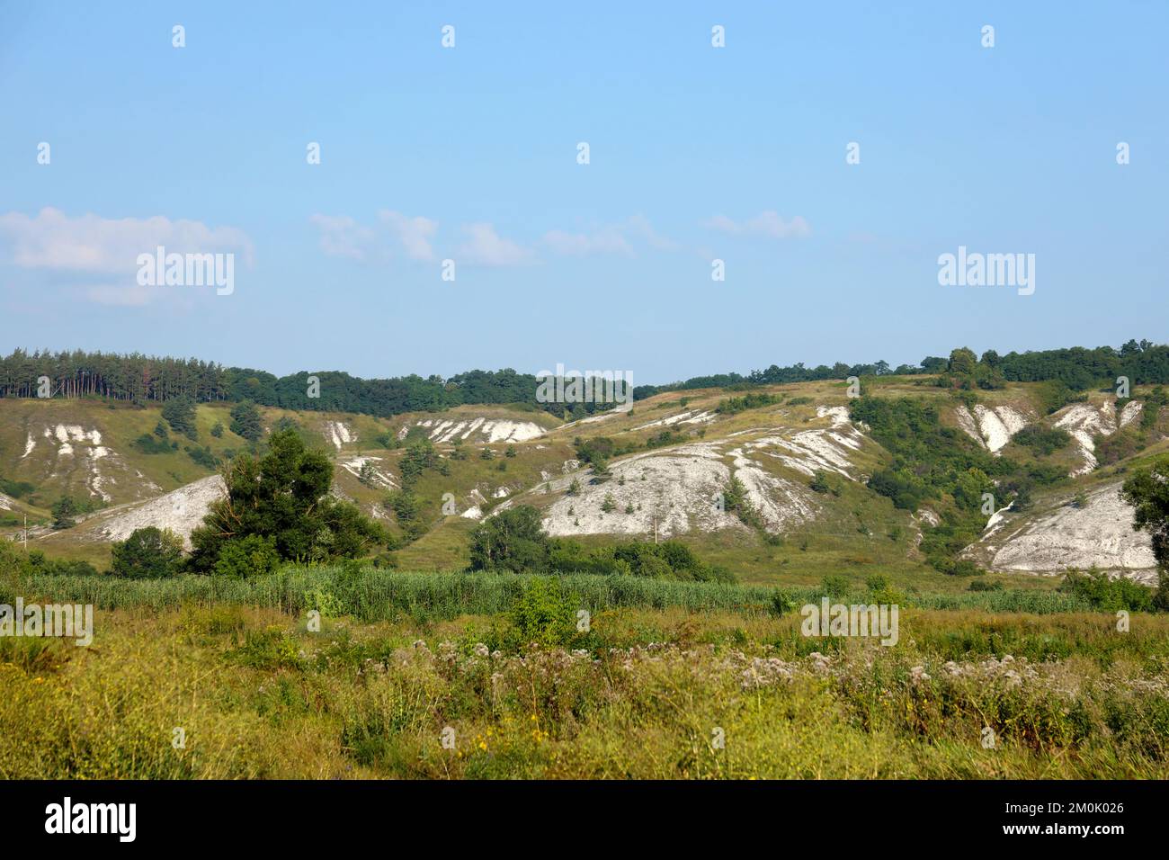 Ancient multimillion chalk mountains on the steppe surface of earth