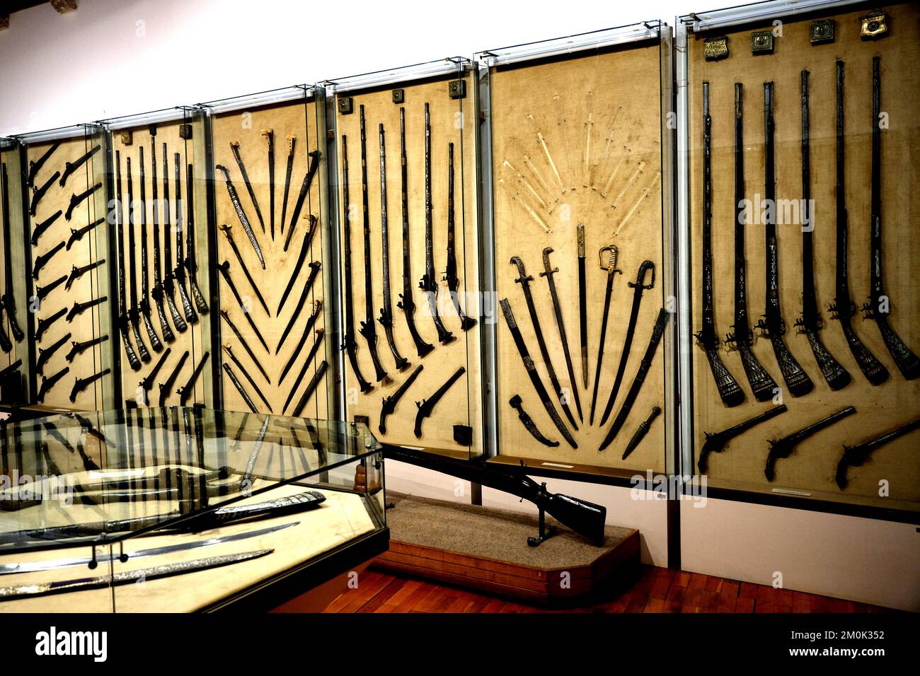 Various guns, swords and knives displayed in the Maritime Museum in Kotor Montenegro Stock Photo