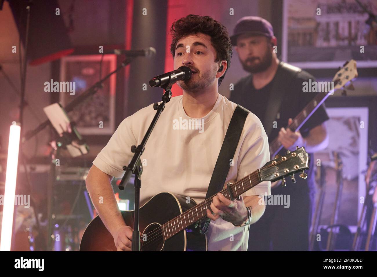 Hamburg, Germany. 06th Dec, 2022. Philipp Dittberner performs during the X-Mas Special of the initiative 'All Hands On Deck', a live fundraising concert of artists from different genres of the German music scene, on stage at the restaurant 'Bullerei'. Credit: Georg Wendt/dpa/Alamy Live News Stock Photo