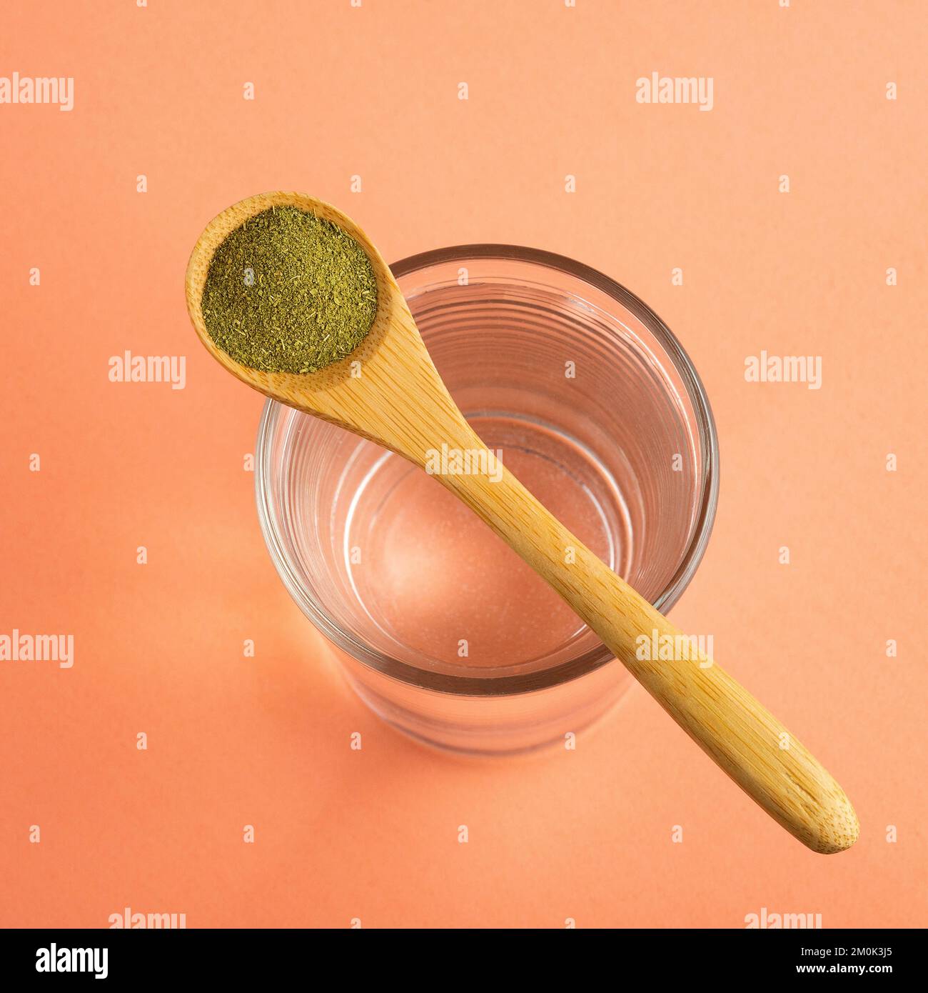 Organic green powder to mix with water Moringa oleifera Stock Photo