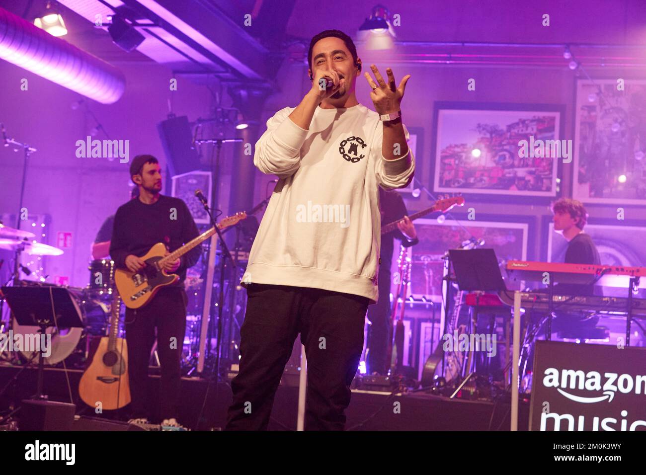 Hamburg, Germany. 06th Dec, 2022. Eko Fresh, rapper, is on stage at the restaurant 'Bullerei' during the X-Mas Special of the initiative 'All Hands On Deck, a live fundraising concert of artists from different genres of the German music landscape. Credit: Georg Wendt/dpa/Alamy Live News Stock Photo