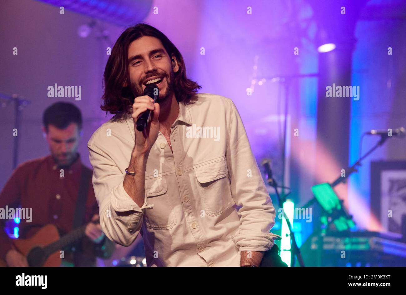 Hamburg, Germany. 07th Dec, 2022. Alvaro Soler, singer, stands on stage in the restaurant 'Bullerei' during the X-Mas Special of the initiative 'All Hands On Deck, a live fundraising concert of artists from different genres of the German music scene. Credit: Georg Wendt/dpa/Alamy Live News Stock Photo